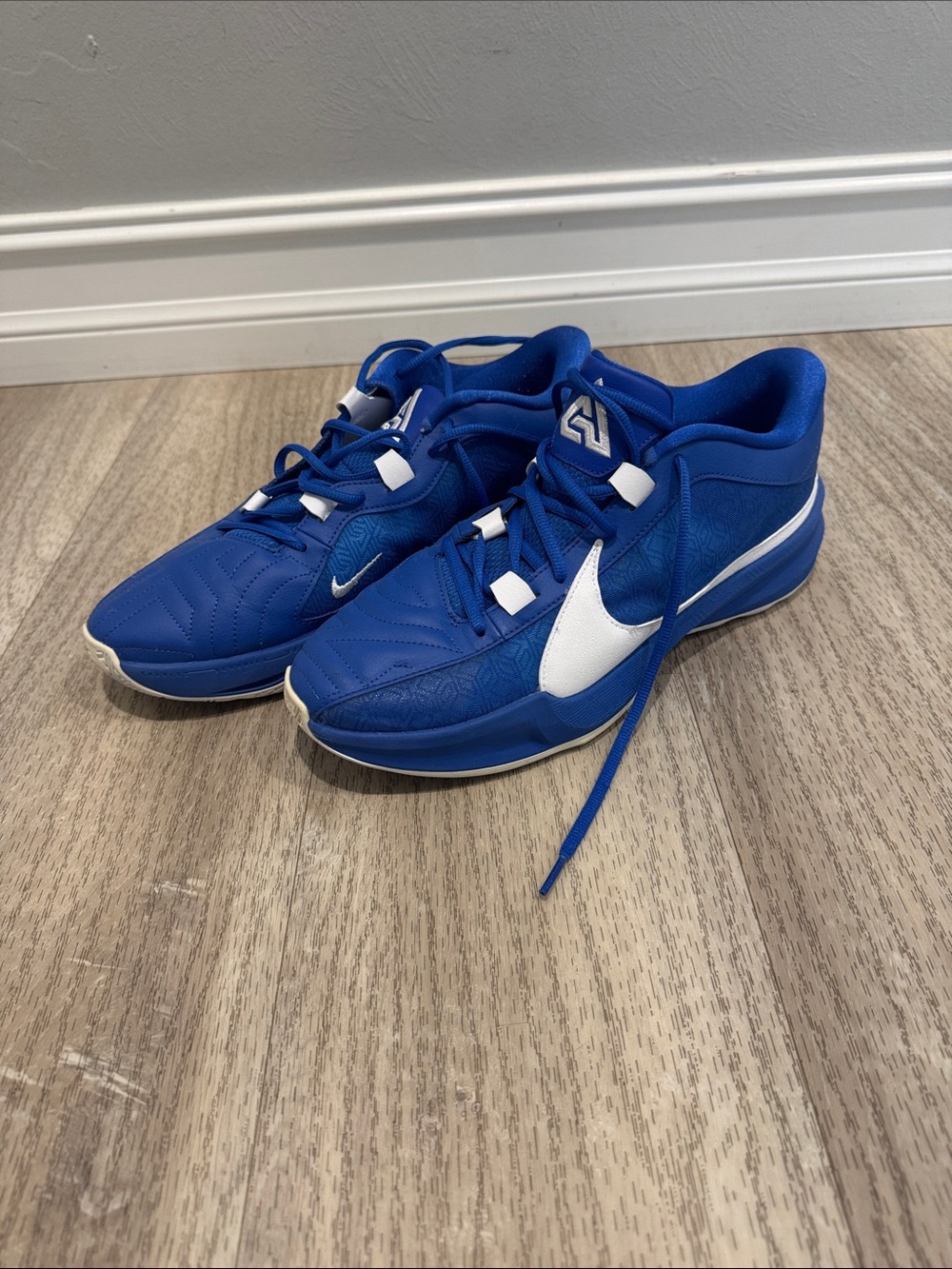 Nike Blue Basketball Sneakers with White Swoosh